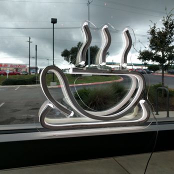 Summer Moon Coffee - Coffee sign looking outside towards Culebra - Coffee & Tea Near Me - San Antonio, Texas