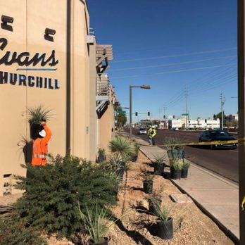 Phoenix Landscape and Lighting - a construction worker working on the exterior of a building - Landscaping Near Me - Scottsdale, Arizona Phoenix Landscape and Lighting - a construction worker working on the exterior of a building - Landscaping Near Me - Scottsdale, Arizona
