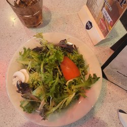 West End Pizza - This was the salad they gave me.  Waitress brought it over and said "sorry it looks like shit".  I agreed and didn't eat it.  Horrible food