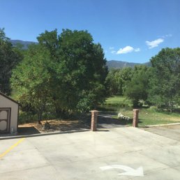 Green space and mountains, parking lot Green space and mountains, parking lot
