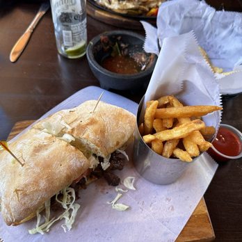 Don Luis Mexican Restaurant - Another great meal: Carnitas pulled pork with coleslaw sandwich on fresh baked bread with dipped French fries. Excellent salsa and chips. - Mexican Near Me - Ione, California Don Luis Mexican Restaurant - Another great meal: Carnitas pulled pork with coleslaw sandwich on fresh baked bread with dipped French fries. Excellent salsa and chips. - Mexican Near Me - Ione, California