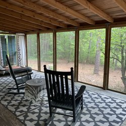 Jackson Farm Guest House - Our favorite place in the whole house. The screened porch. If you're quiet enough, you'll see some cool critters by the lake out here.