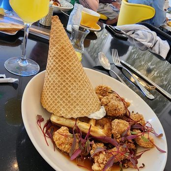 Crack'D Brunch - friend chicken waffle cone maple hot sauce and goat cheese! best dish!! - Breakfast & Brunch Near Me - New Orleans, Louisiana Crack'D Brunch - friend chicken waffle cone maple hot sauce and goat cheese! best dish!! - Breakfast & Brunch Near Me - New Orleans, Louisiana