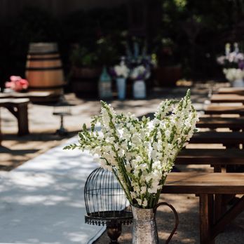 Capo Creek Winery - a watering can with flowers - Wine Tasting Room Near Me - Healdsburg, California