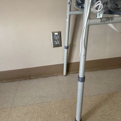 North Central Baptist Hospital - Commode with rusted legs missing rubber cap on one leg