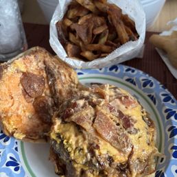 Burger and fries and chips.