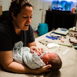 Emergence - Midwife Caitlyn doing baby girls newborn exam 2 hours after birth