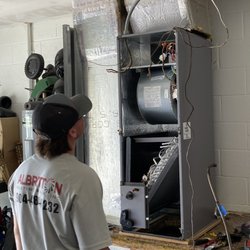 Albritton Heating & Air Conditioning - Putting in the new unit.