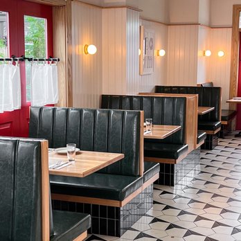 Parm - a restaurant with black and white checkered floor - Italian Near Me - Woodbury, New York Parm - a restaurant with black and white checkered floor - Italian Near Me - Woodbury, New York