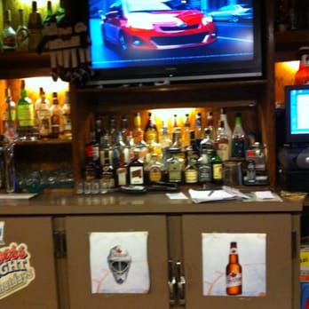Top Shelf Bar & Grill - a tv with a car on it - Canadian (New) Near Me - Ajax, Ontario Top Shelf Bar & Grill - a tv with a car on it - Canadian (New) Near Me - Ajax, Ontario