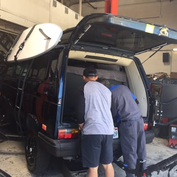 Maxed Performance - Ed showing Ton a problematic hose. - Auto Repair Near Me - Huntington Beach, California Maxed Performance - Ed showing Ton a problematic hose. - Auto Repair Near Me - Huntington Beach, California