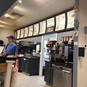 Barb City Bagels - a man standing at the counter - Bagels Near Me - Dekalb, Illinois Barb City Bagels - a man standing at the counter - Bagels Near Me - Dekalb, Illinois