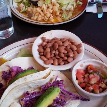 The Shed - Mahi mahi fish tacos... best I've had! I subbed beans for the usual rice; my guy's taco/enchilada plate with Christmas chile is at the top - New Mexican Cuisine Near Me - Santa Fe, New Mexico The Shed - Mahi mahi fish tacos... best I've had! I subbed beans for the usual rice; my guy's taco/enchilada plate with Christmas chile is at the top - New Mexican Cuisine Near Me - Santa Fe, New Mexico