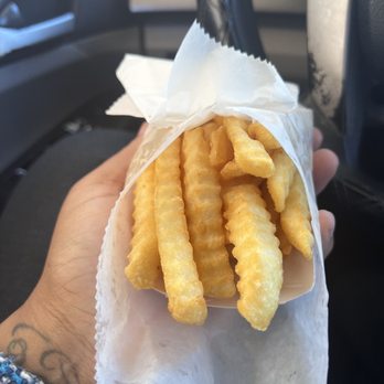 What A Burger - a person holding a bag of french fries - Fast Food Near Me - West Columbia, South Carolina What A Burger - a person holding a bag of french fries - Fast Food Near Me - West Columbia, South Carolina