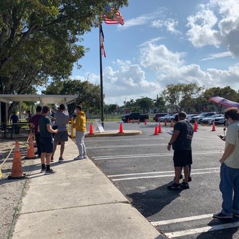 Driver Licenses Department - Clients waiting uncomfortably in the heat - Departments of Motor Vehicles Near Me - Miami, Florida Driver Licenses Department - Clients waiting uncomfortably in the heat - Departments of Motor Vehicles Near Me - Miami, Florida