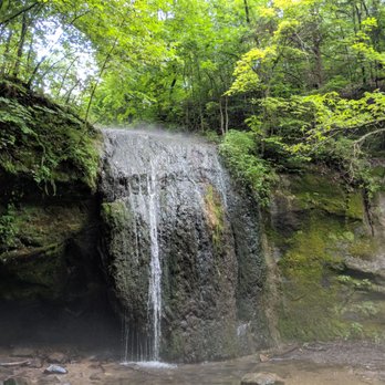 Governor Dodge State Park - Stephens Falls hiking trail waterfall after a good rain. It was hot that day so steam came rolling off the top which was cool. - Parks Near Me - Dodgeville, Wisconsin Governor Dodge State Park - Stephens Falls hiking trail waterfall after a good rain. It was hot that day so steam came rolling off the top which was cool. - Parks Near Me - Dodgeville, Wisconsin