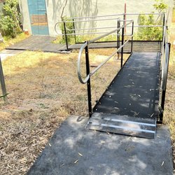 Amramp - Securely bridged a cutaway section of the yard with a safe slope to the ramp.