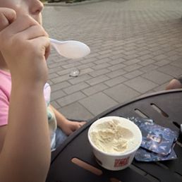 My baby girl enjoying her vanilla ice cream. My baby girl enjoying her vanilla ice cream.