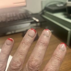 Elegant Nails - Chipped 2 days, ugly , and bad attitude of technician, had attitude about fixing for me and 2 days later, happened again. 100.00$