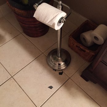 Dream Day Spa - broken toilet paper dispenser- pieces everywhere - Day Spas Near Me - Folsom, California