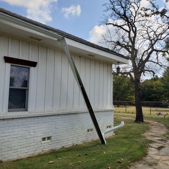 Performance Painting - a pole leaning against a house - General Contractors Near Me - McKinney, Texas Performance Painting - a pole leaning against a house - General Contractors Near Me - McKinney, Texas