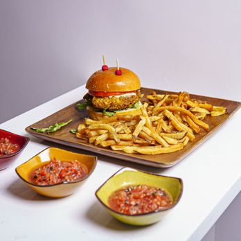Saya Salteña - a burger and french fries - Latin American Near Me - Washington, DC, District of Columbia
