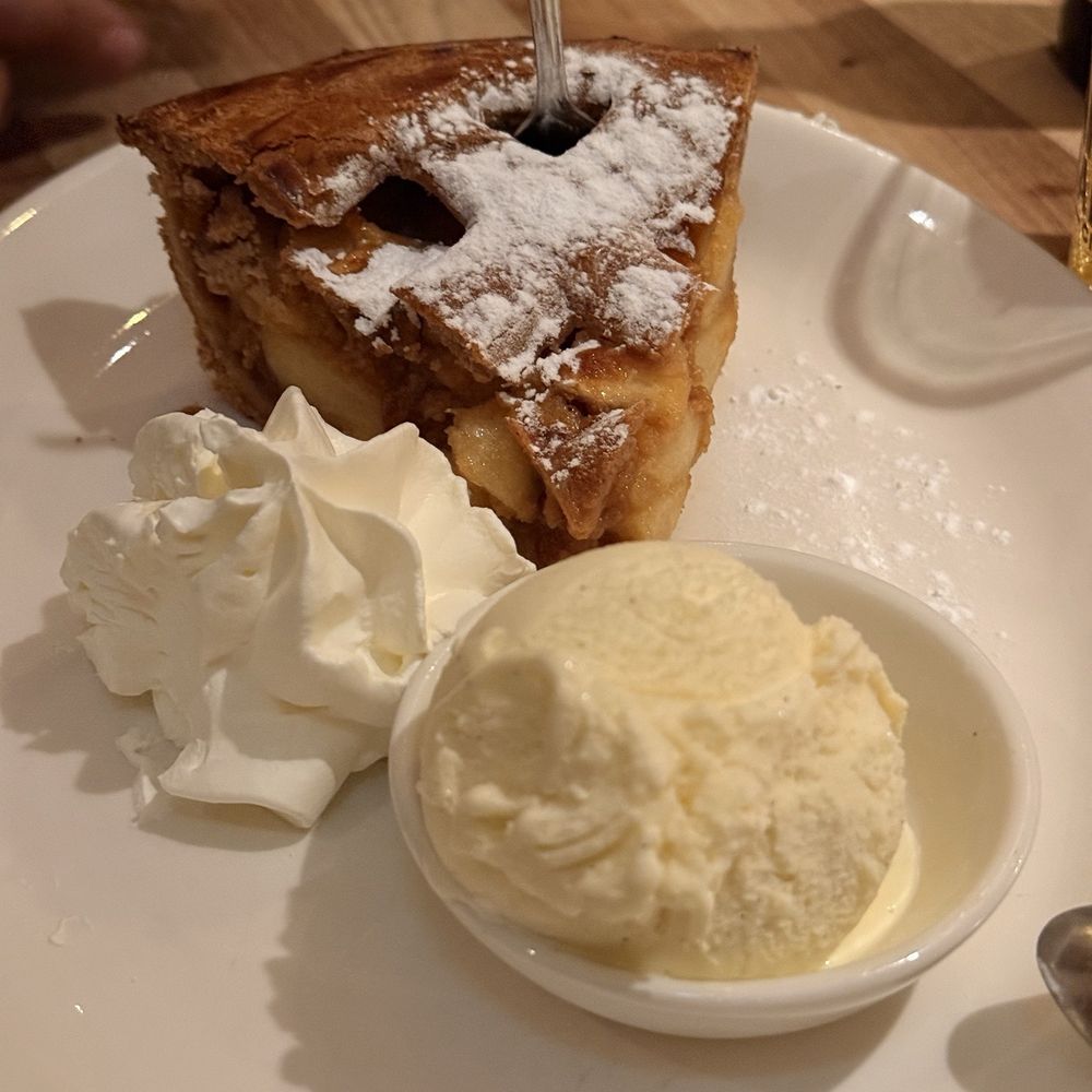 Loetje Centraal - Appeltaart | Apple pie, with vanilla ice cream and whipped cream - Modern European Near Me - Amsterdam, New Hampshire Loetje Centraal - Appeltaart | Apple pie, with vanilla ice cream and whipped cream - Modern European Near Me - Amsterdam, New Hampshire