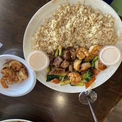 Hibachi Express - Steak and shrimp plain fried rice with a side of vegetables and extra shrimp