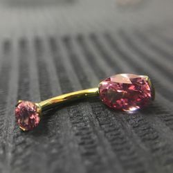 TLC Tattoo - Swarovski crystal navel bar, which we anodised yellow for a customer. We can anodise titanium body jewellery for you on request.