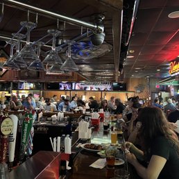 people sitting at the bar people sitting at the bar