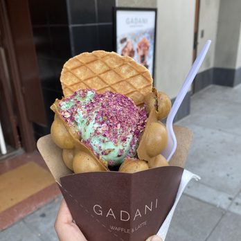 Gadani - Almond pistachio ice cream in matcha egg waffle with rose petals and butter wafer - Coffee & Tea Near Me - Berkeley, California Gadani - Almond pistachio ice cream in matcha egg waffle with rose petals and butter wafer - Coffee & Tea Near Me - Berkeley, California