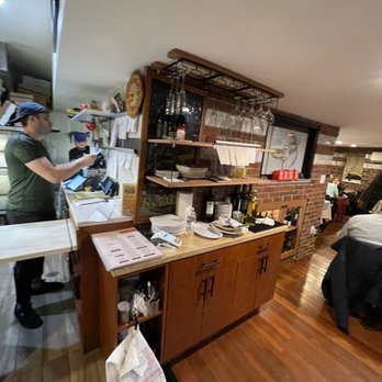 Napoli Pizza & Pasta - two people in a kitchen - Pizza Near Me - Astoria, New York Napoli Pizza & Pasta - two people in a kitchen - Pizza Near Me - Astoria, New York