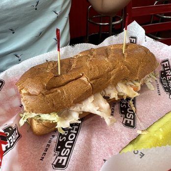 Firehouse Subs - a close up of a sub sandwich - Fast Food Near Me - New Smyrna Beach, Florida