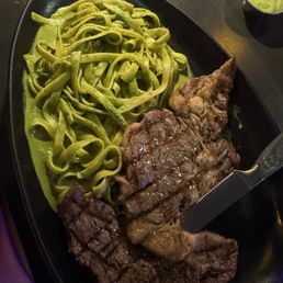 Rib eye with pesto pasta