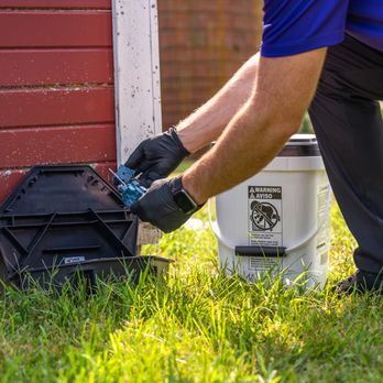 Preferred Pest Management - Technician filling rodent bait station - Pest Control Near Me - Gilbert, Iowa Preferred Pest Management - Technician filling rodent bait station - Pest Control Near Me - Gilbert, Iowa
