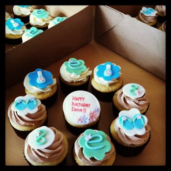 Cupnest - a box of cupcakes with frosting - Desserts Near Me
