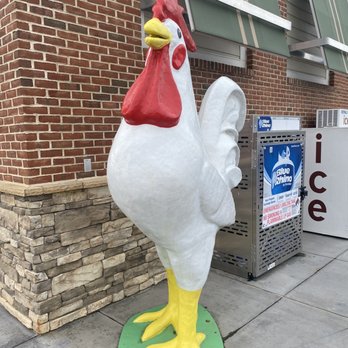 Royal Farms - a large chicken statue on the sidewalk - Gas Stations Near Me - White Marsh, Maryland