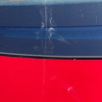 Tesla - scratch down to the metal and scratch in rear window - Car Dealers Near Me - Paramus, New Jersey