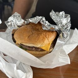 Lucky Wishbone - My buddies cheeseburger .. came with lots of cheese