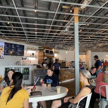 ManaHouse Coffee - a group of people sitting around a table - Coffee & Tea Near Me - Jacksboro, Tennessee