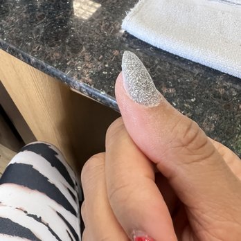 GoBahli Nails - This silver nail is what was "repaired" and this what she called finished. - Nail Salons Near Me - Carlsbad, California GoBahli Nails - This silver nail is what was "repaired" and this what she called finished. - Nail Salons Near Me - Carlsbad, California