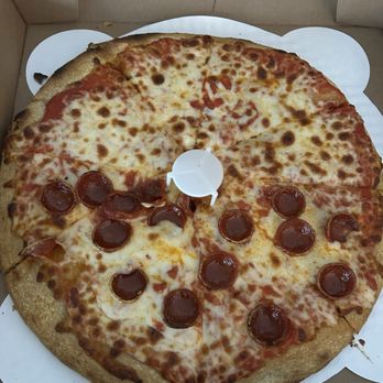 Flourchild Pizza - Half pep half cheese...cut apparently by a 2yr old - Pizza Near Me - Milwaukee, Wisconsin