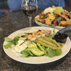 Rudy's Pub & Grill - Shrimp Louis salad and house Merlot