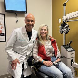 Amir Ahmad, MD - Dr. Amir with a happy patient who received the Light Adjustable Lens (LAL).