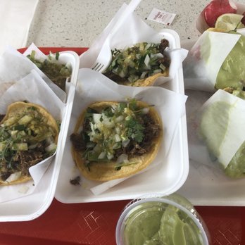 Tacos La Central - Left to right: 2 beef cheek (cachete), 2 beef head (cabeza), and 2 carne asada. A side of guacamole. - Tacos Near Me - Rialto, California