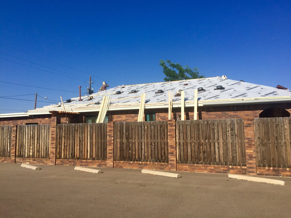 Slide of Hartman Roofing