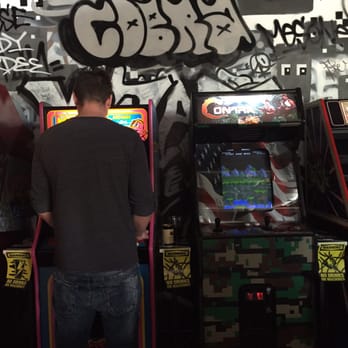 Cobra Arcade Bar - Sample arcade games, my man owning Ms. Pacman - Bars Near Me - Phoenix, Arizona