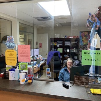 Roger N. Danziger, MD - Front office with happy office manager waiting to welcome patients.           Dr. Danziger - Allergists Near Me - Bradenton, Florida