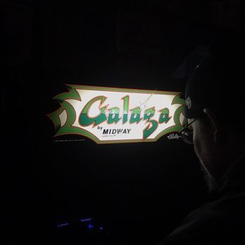 8 Bit Arcade Bar - My 40 year old brother nerding out in a game he dominated when he worked at Midway gaming. - Bars Near Me - Renton, Washington