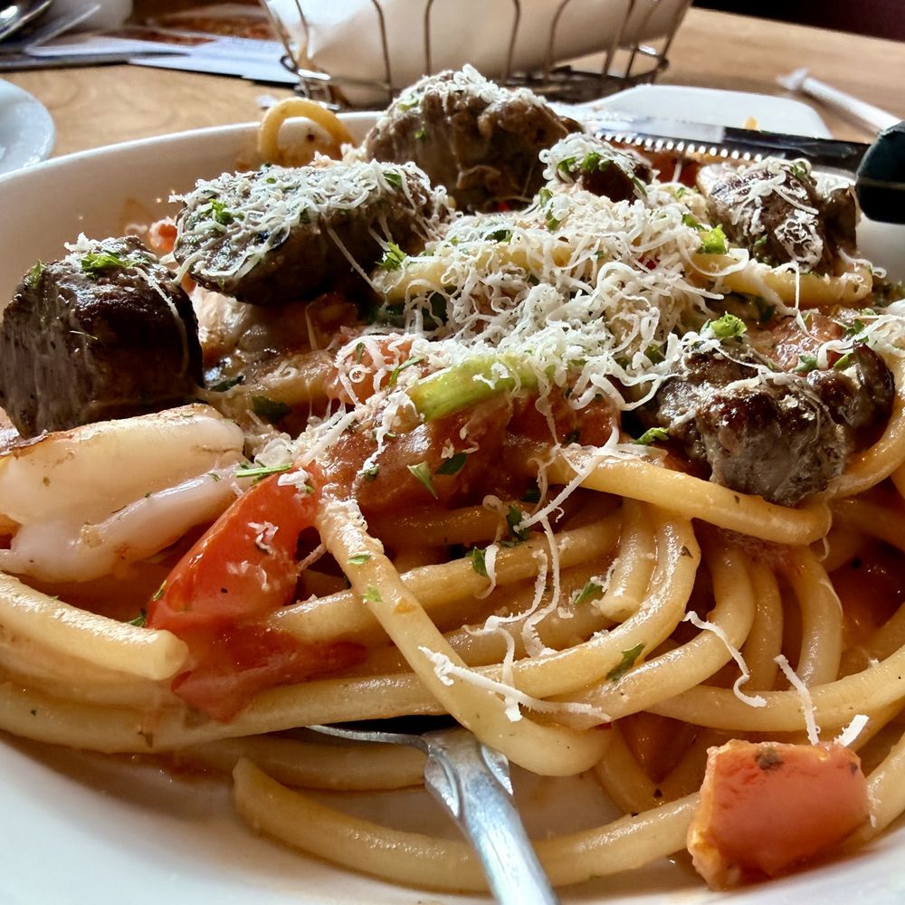 Olive Garden Italian Restaurant - Calabrian steak and shrimp bucatini - Italian Near Me - Sandy, Utah Olive Garden Italian Restaurant - Calabrian steak and shrimp bucatini - Italian Near Me - Sandy, Utah